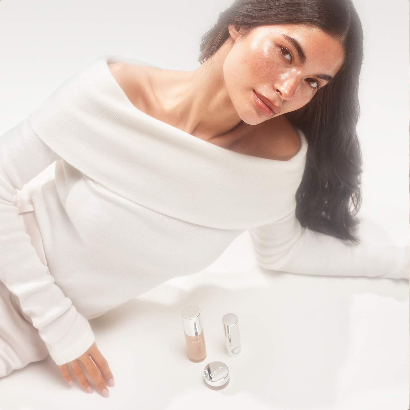 Woman wearing Wake me up complexion enhancer and Wake me up cream